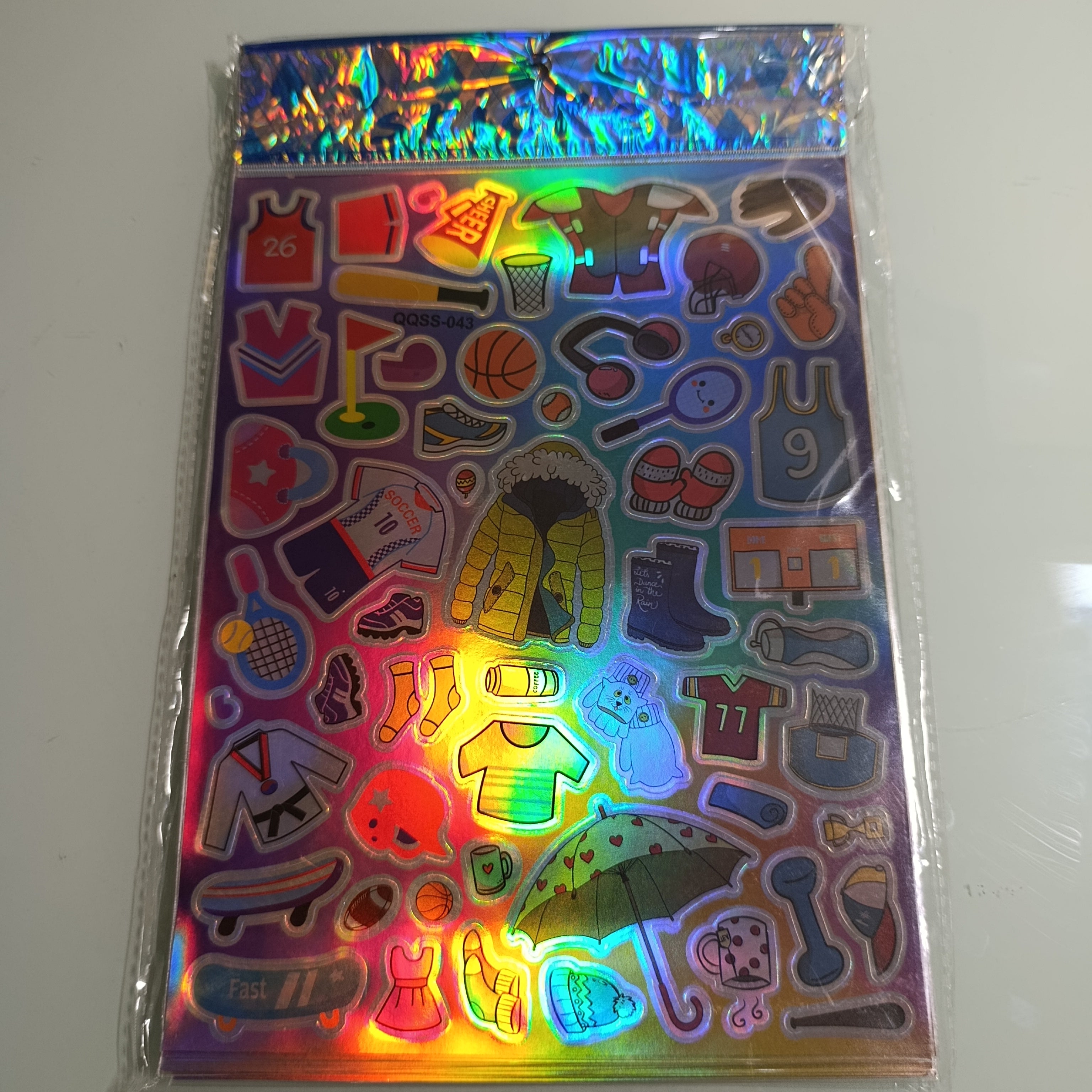 STICKER CALCOMANIA LASER METALICA 28X17.5 CM POR MAYOREO