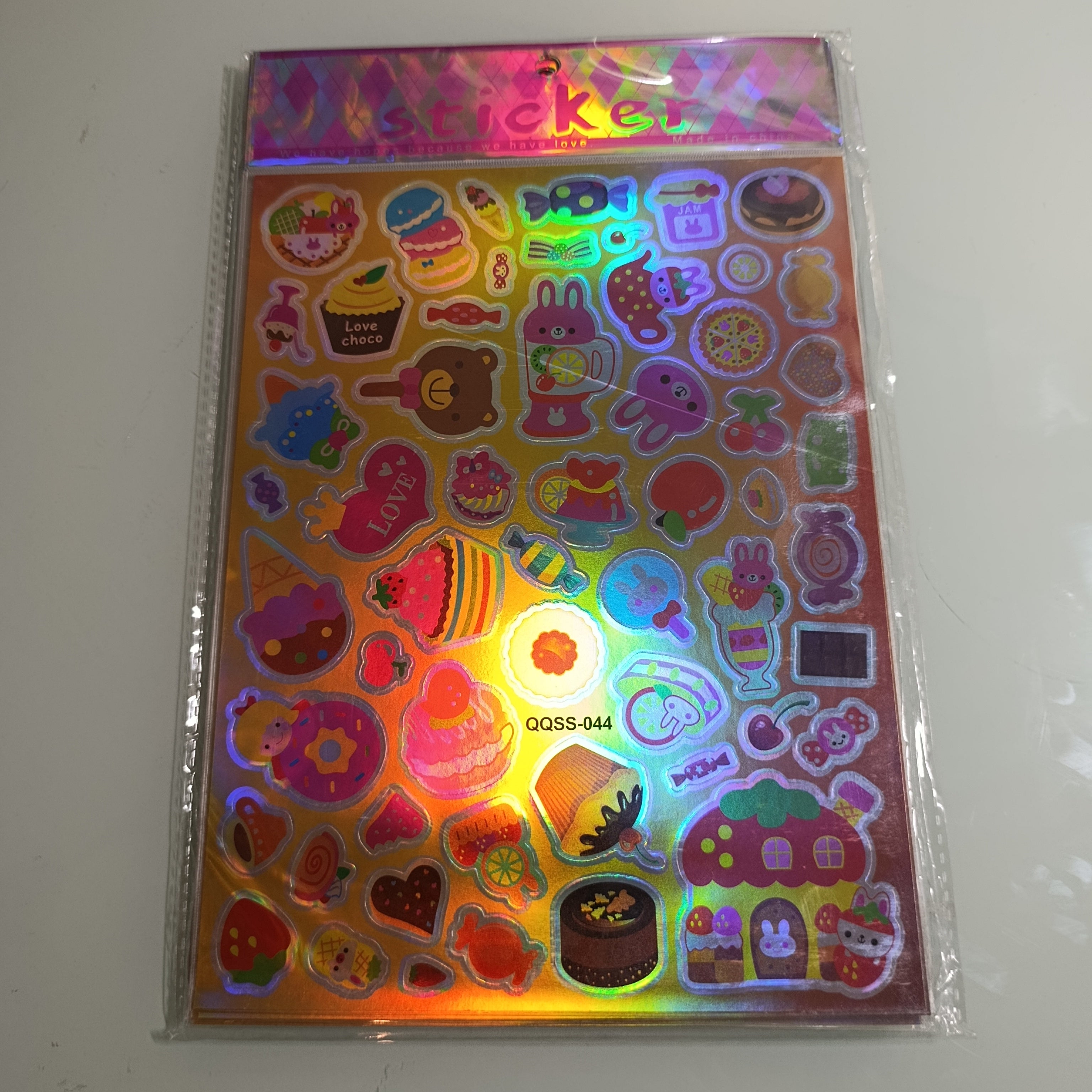 STICKER CALCOMANIA LASER METALICA 28X17.5 CM POR MAYOREO