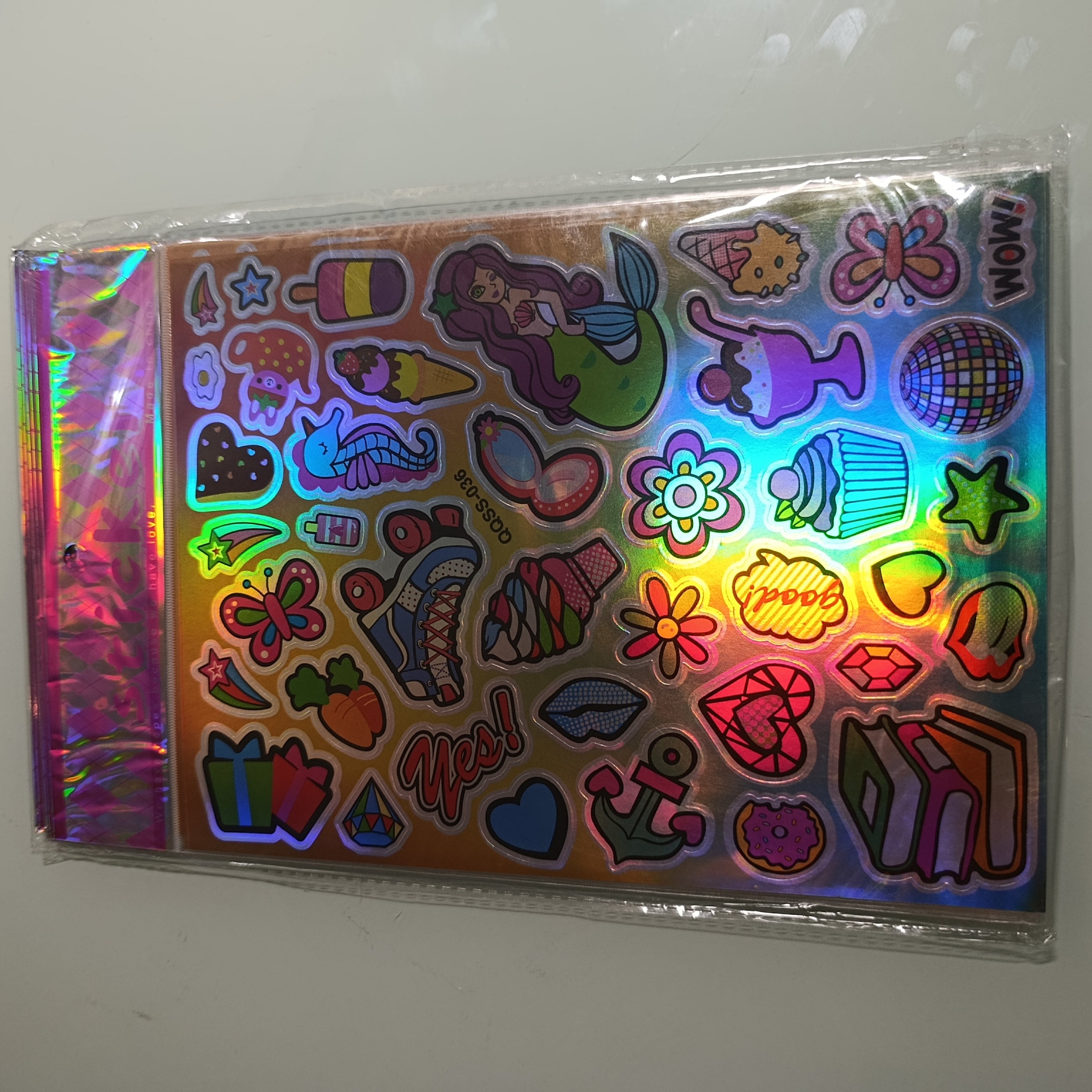 STICKER CALCOMANIA LASER METALICA 28X17.5 CM POR MAYOREO