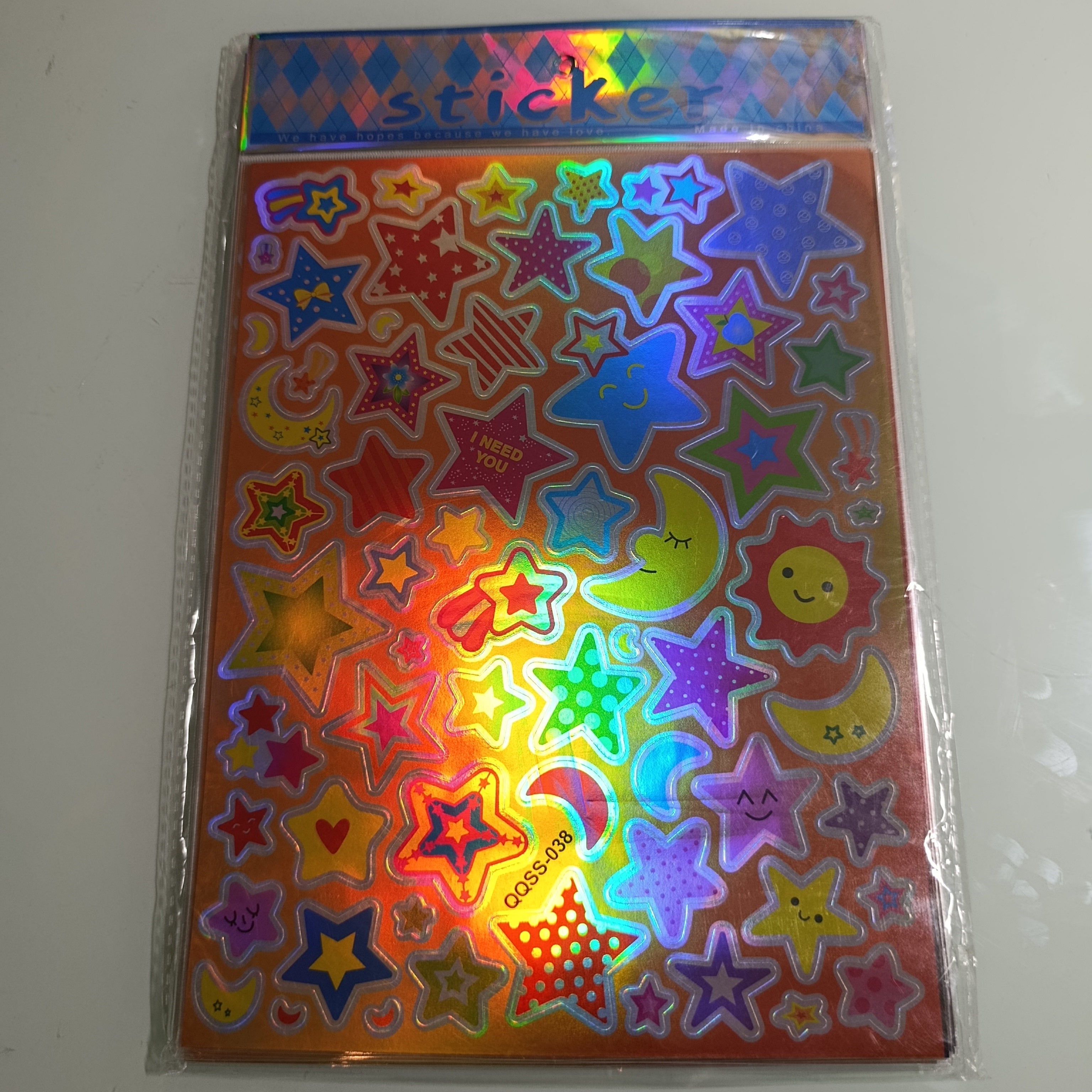 STICKER CALCOMANIA LASER METALICA 28X17.5 CM POR MAYOREO