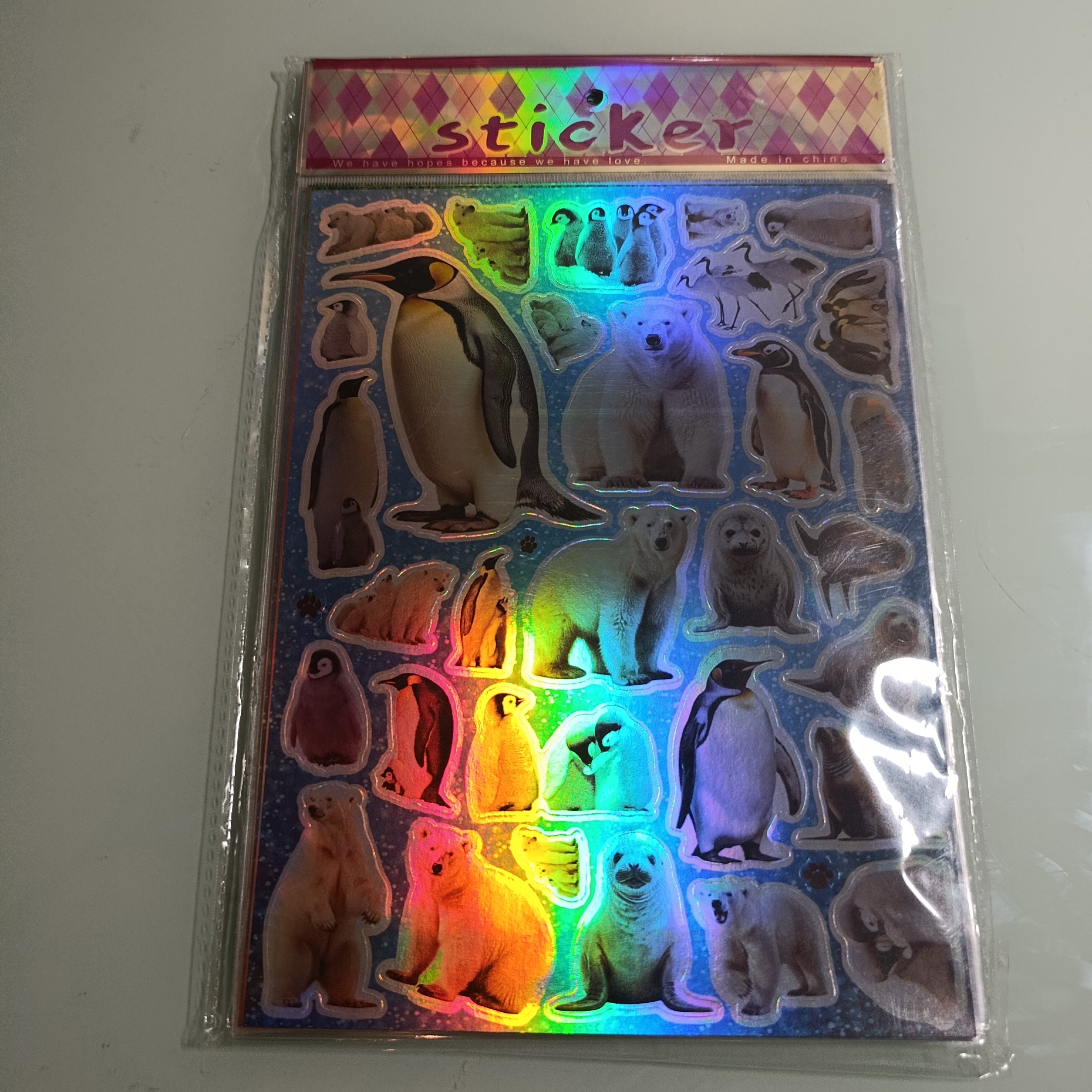 STICKER CALCOMANIA LASER METALICA 28X17.5 CM POR MAYOREO