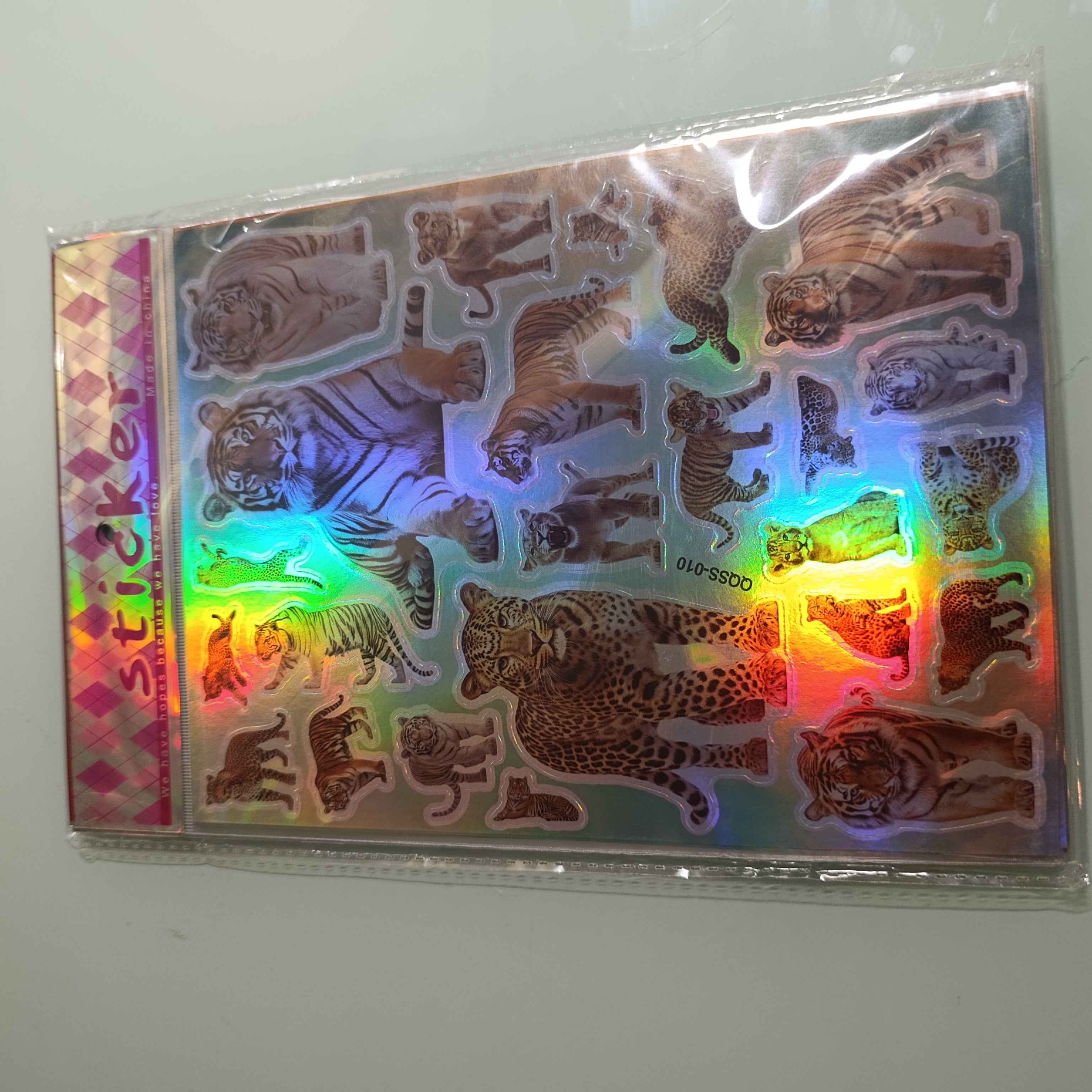 STICKER CALCOMANIA LASER METALICA 28X17.5 CM POR MAYOREO