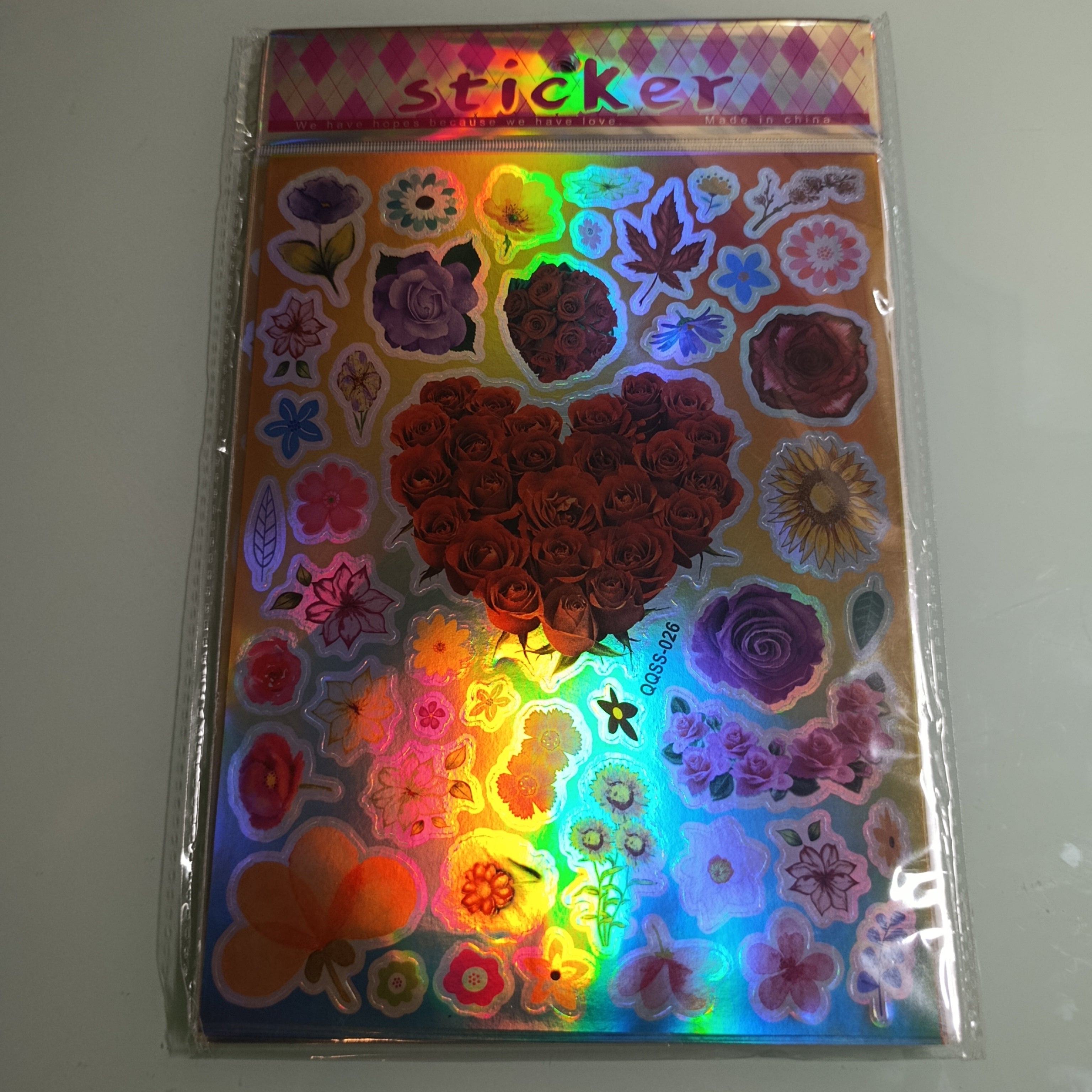 STICKER CALCOMANIA LASER METALICA 28X17.5 CM POR MAYOREO