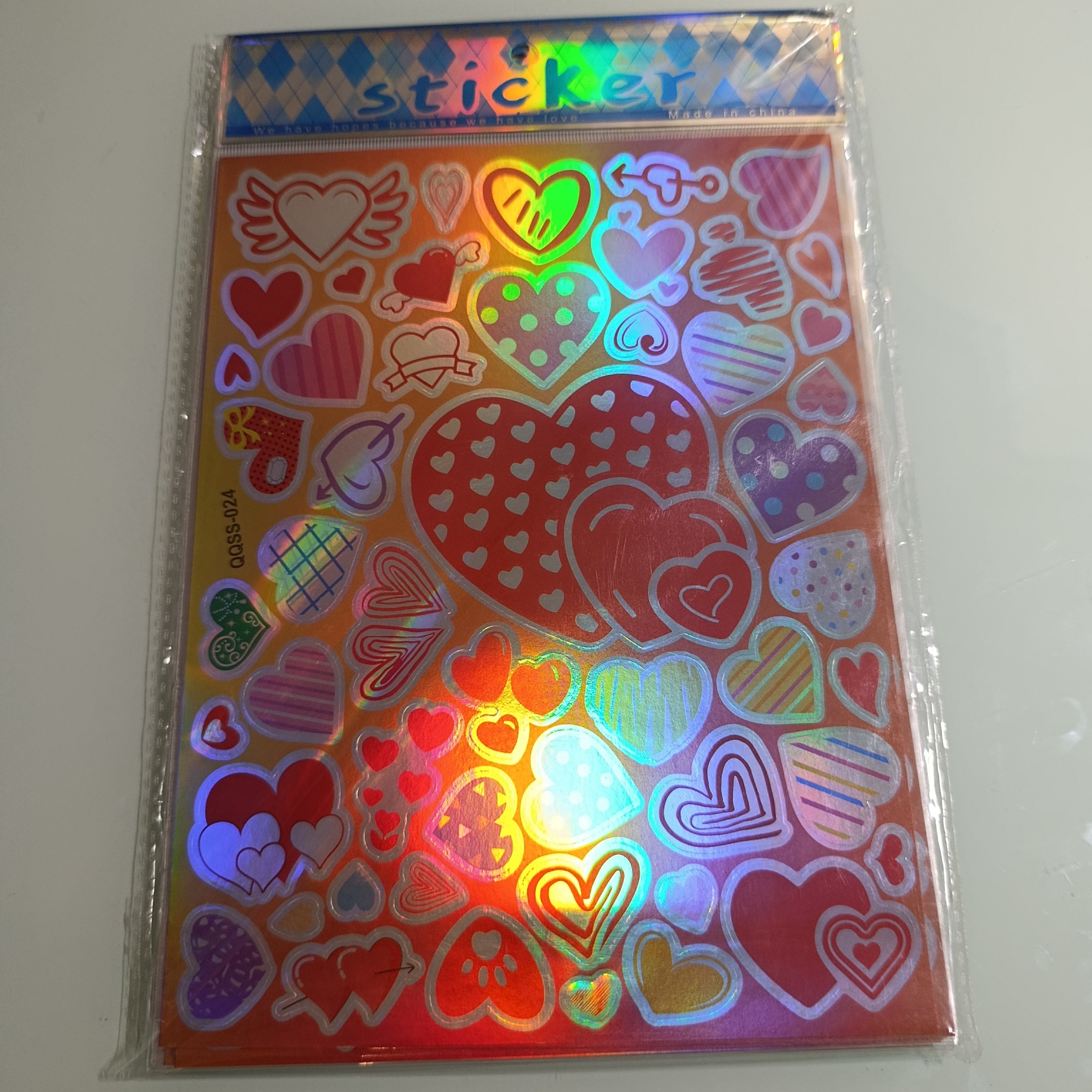 STICKER CALCOMANIA LASER METALICA 28X17.5 CM POR MAYOREO