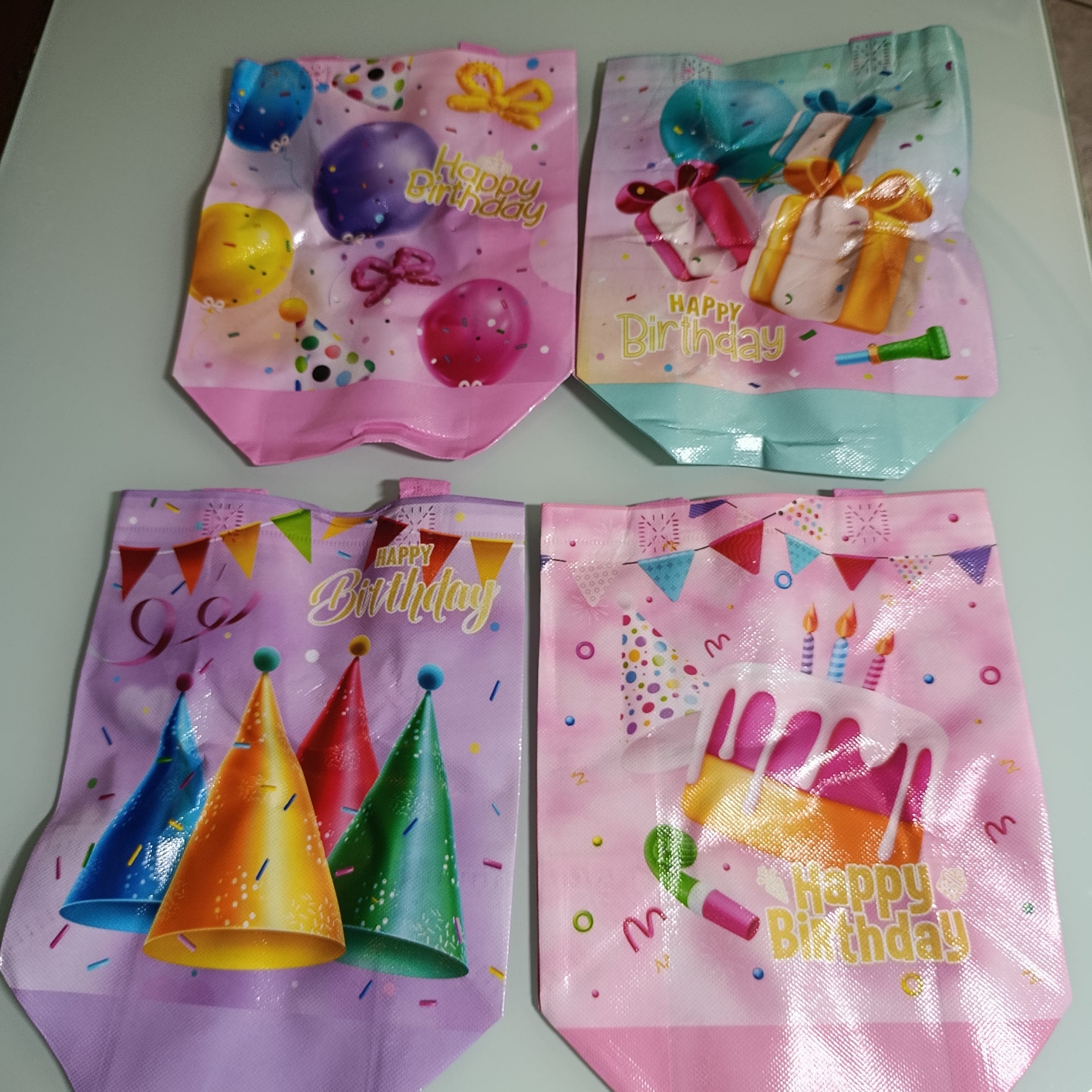 BOLSA DE POLIPROPILENO 29X22 CM SURTIDO EN COLORES Y DISEÑOS DE FIESTA POR MAYOREO