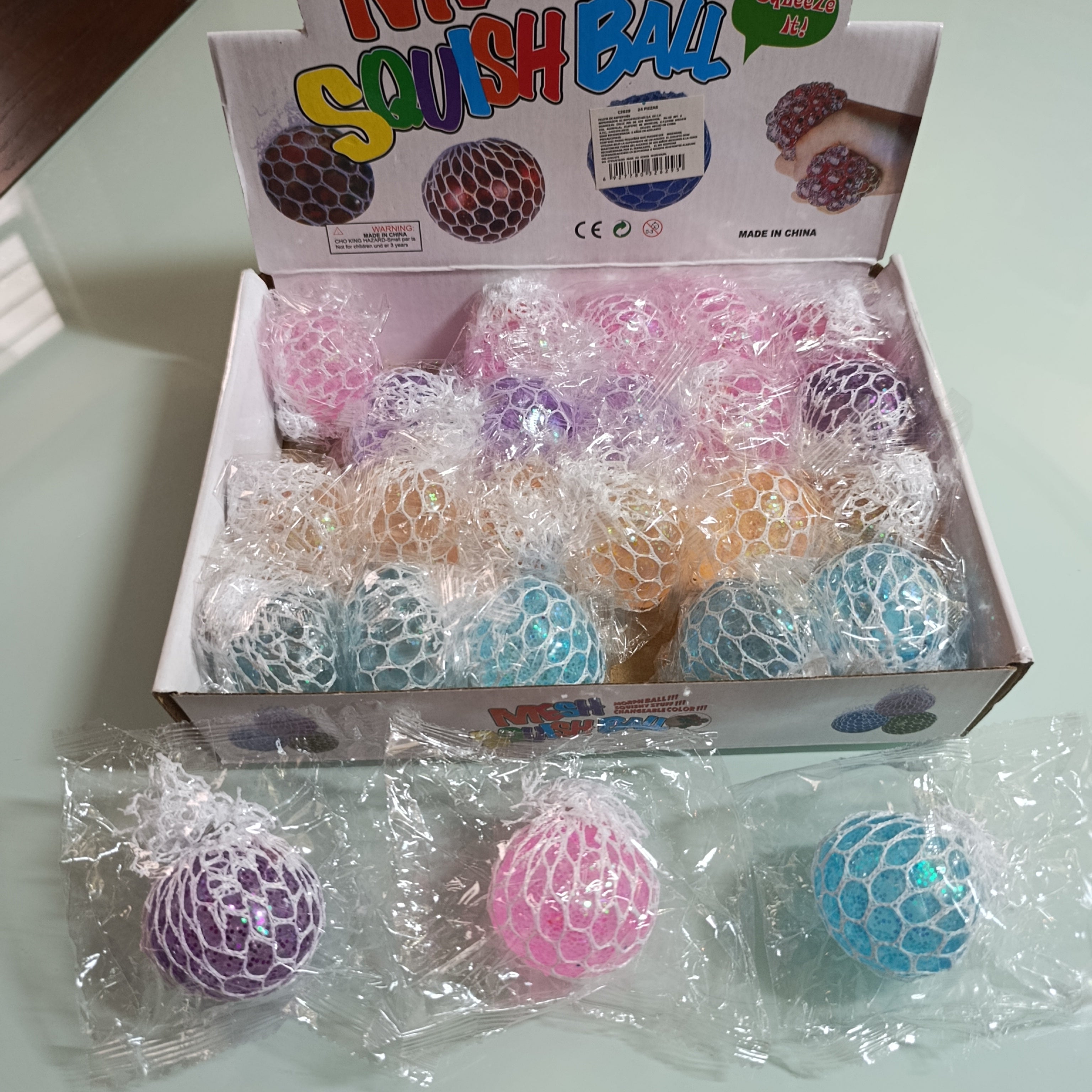 BOLA DE UVA SQUIZI ANTIESTRES 5 CM SURTIDA EN COLORES POR MAYOREO
