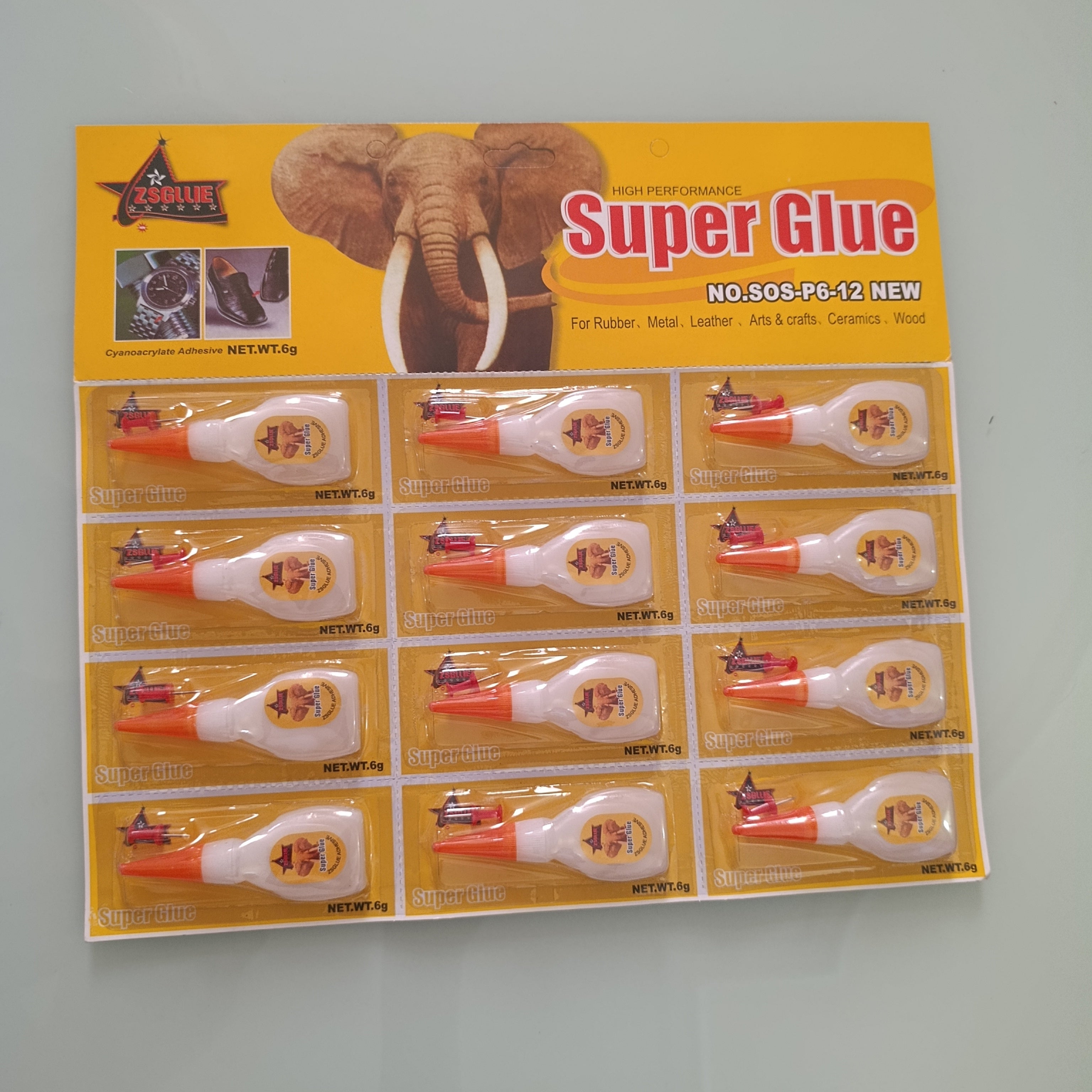 H1449- 12 PZAS PEGAMENTO SUPER GLUE HIGH PERFORMANCE PARA METAL, PLASTICO , PIEL, CERAMICA, MADERA, EN EXHIBIDOR POR MAYOREO