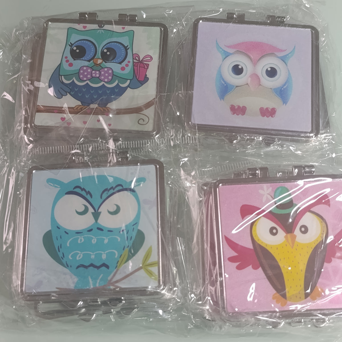 ESPEJO DE BOLSILLO MOTIVOS BUHO POR MAYOREO CON 12 PZAS