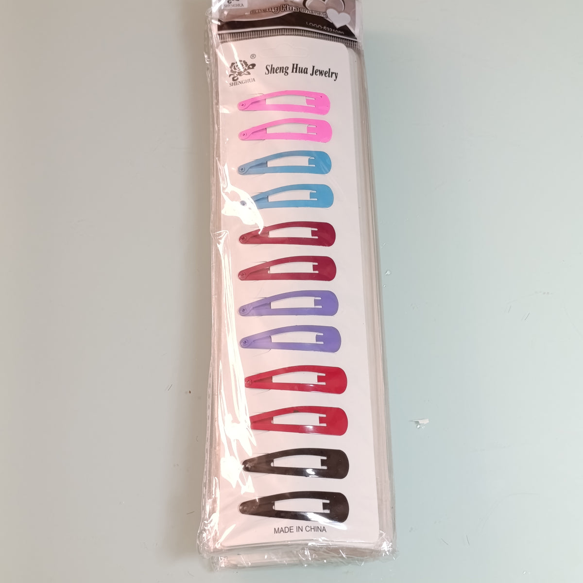 SET DE CUCAS DE 4.5 CM DE COLORES PARA EL CABELLO POR MAYOREO CON 12 SETS