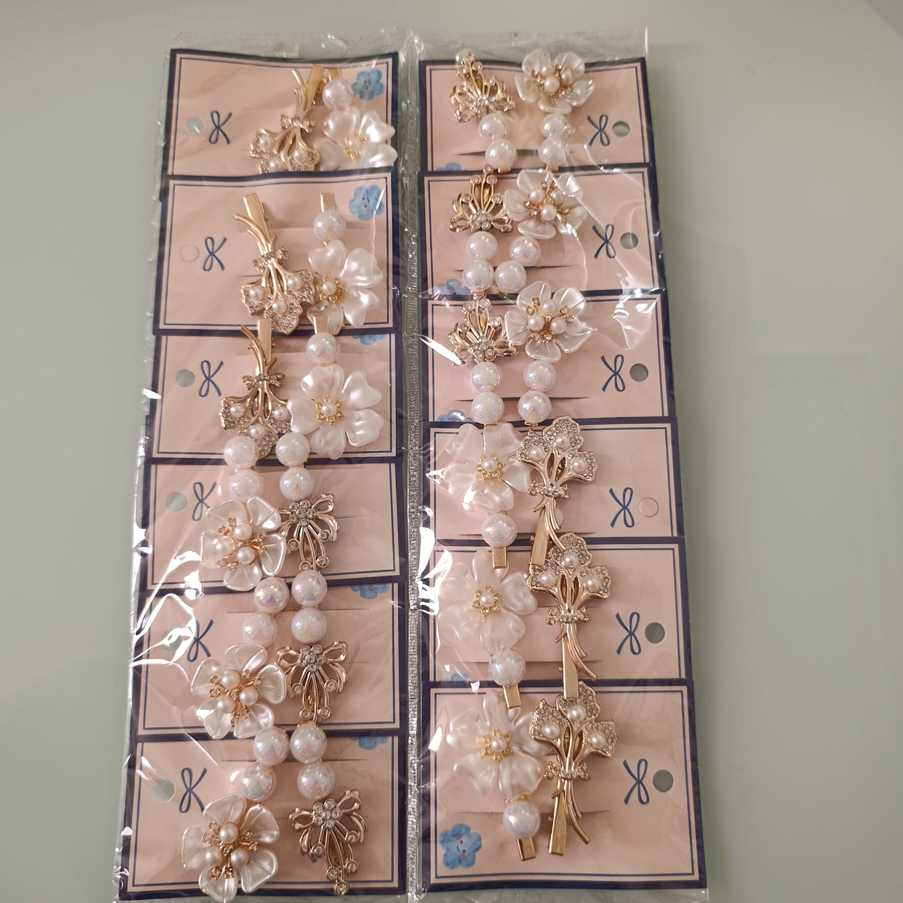 PICO BROCHE DECORADO POR PAR DISEÑOS CON PIEDRERIA DE FANTASIA SURTIDOS POR MAYOREO