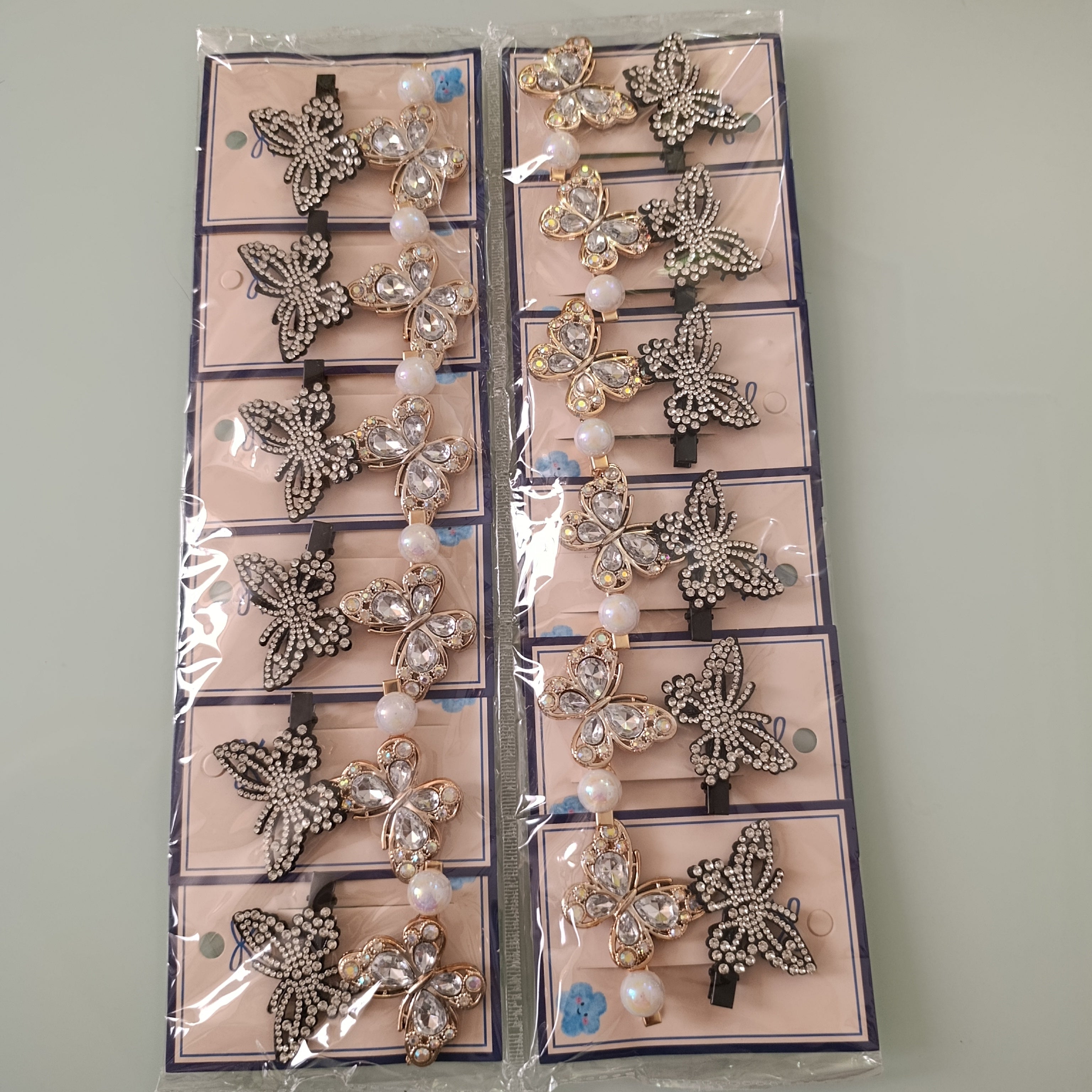 PICO BROCHE DECORADO POR PAR DISEÑOS CON PIEDRERIA DE FANTASIA SURTIDOS POR MAYOREO